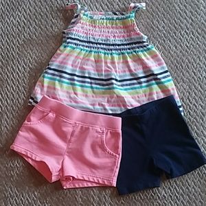 Striped tank top with pink shorts and blue shorts